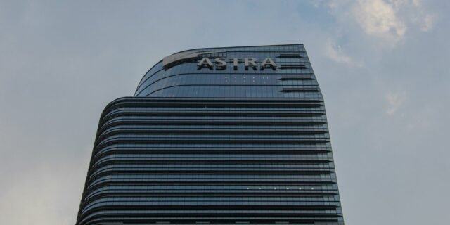 a tall building with a sky background