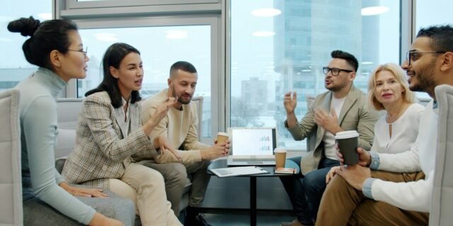 Diverse group of people in a modern office meeting